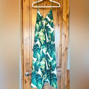 Long dress with green tropical leaves.